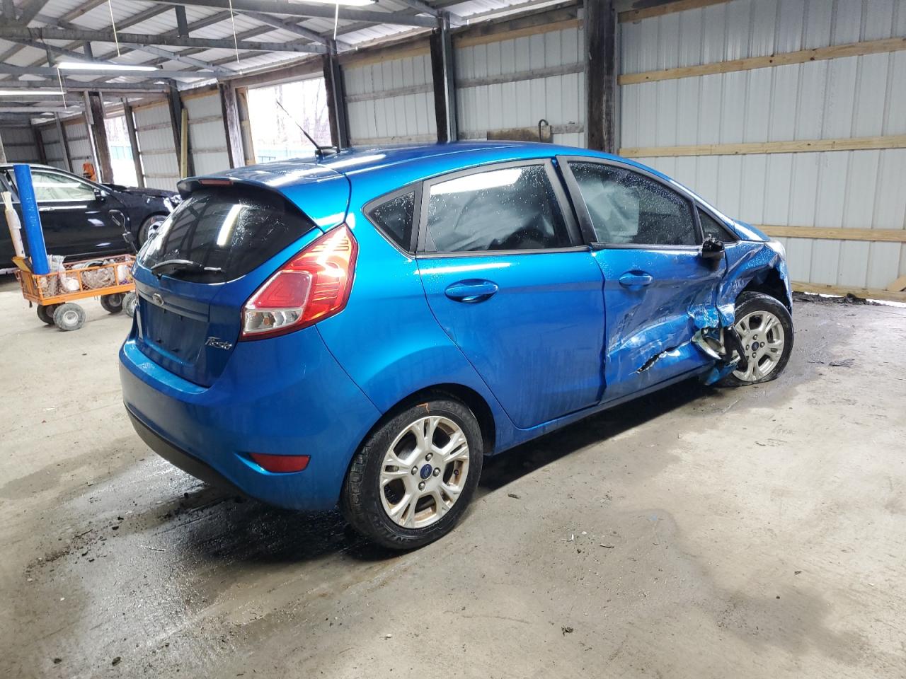 2015 Ford Fiesta VIN 3FADP4EJ5FM176009 Copart auction photo, all over / undercarriage damage thumbnail 3