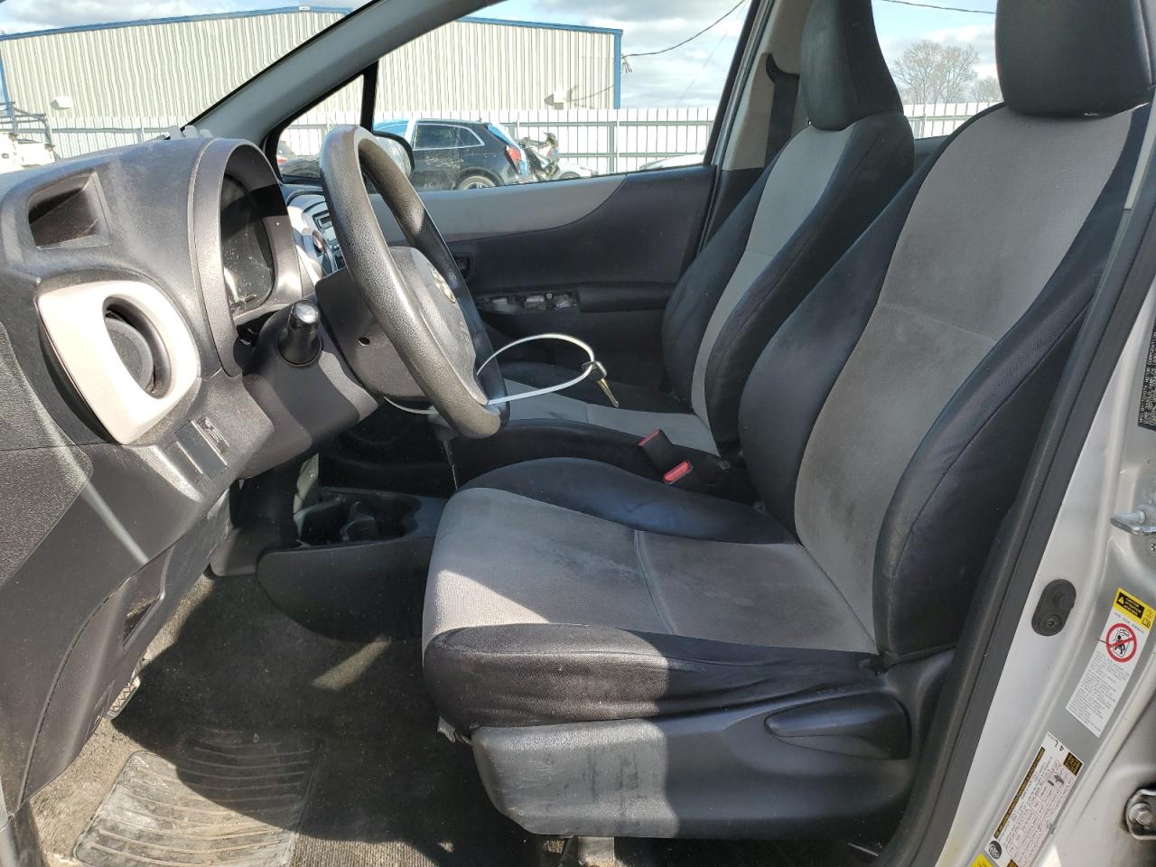 2012 Toyota Yaris VIN JTDKTUD38CD507298 Copart auction photo, all over damage thumbnail 7