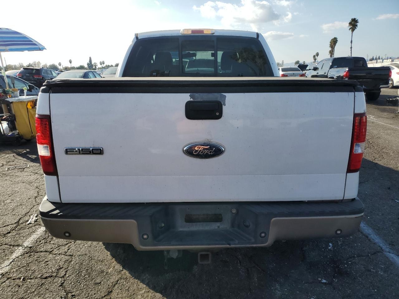 2006 Ford F-150 VIN 1FTPW12526KC02413 Copart auction photo, rear end / minor dent/scratches damage thumbnail 6
