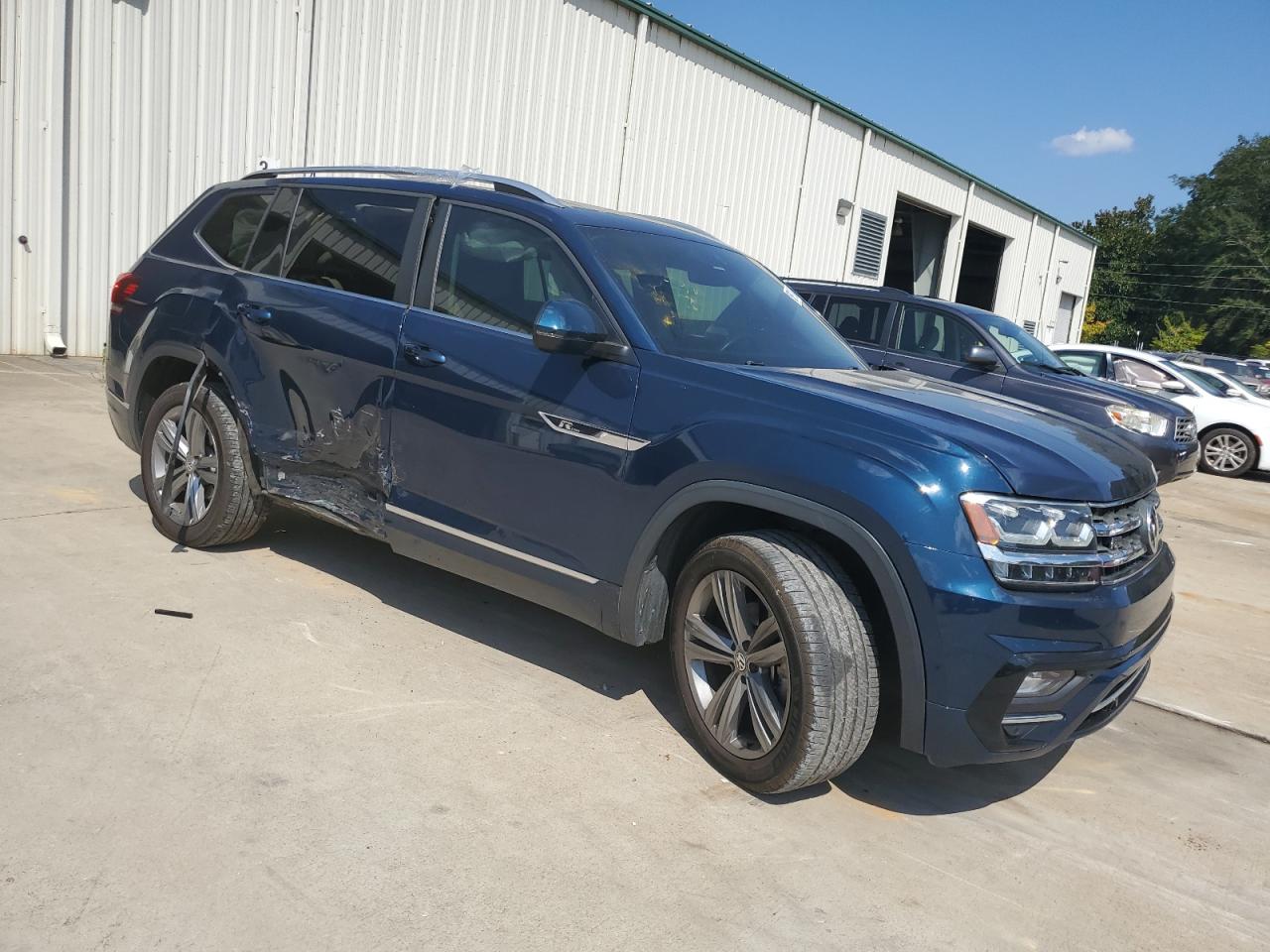2018 Volkswagen Atlas VIN 1V2SR2CAXJC574554 Copart auction photo, side damage thumbnail 4