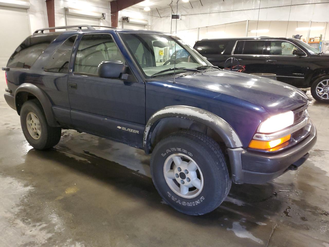 1999 Chevrolet Blazer VIN 1GNCT18W9XK157387 Copart auction photo, rear end / front end damage thumbnail 4