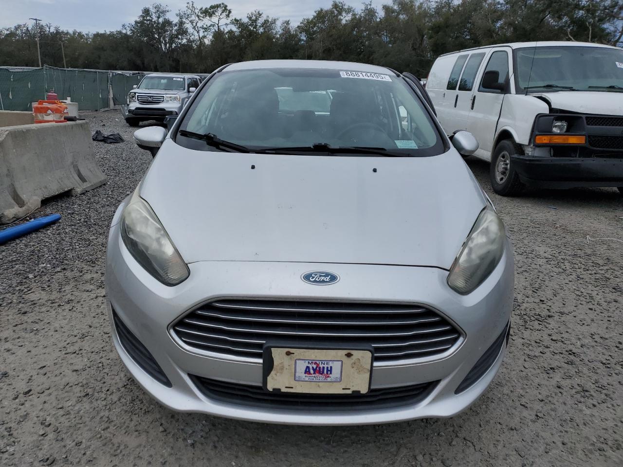 2015 Ford Fiesta VIN 3FADP4EJ6FM216534 Copart auction photo, side / front end damage thumbnail 5