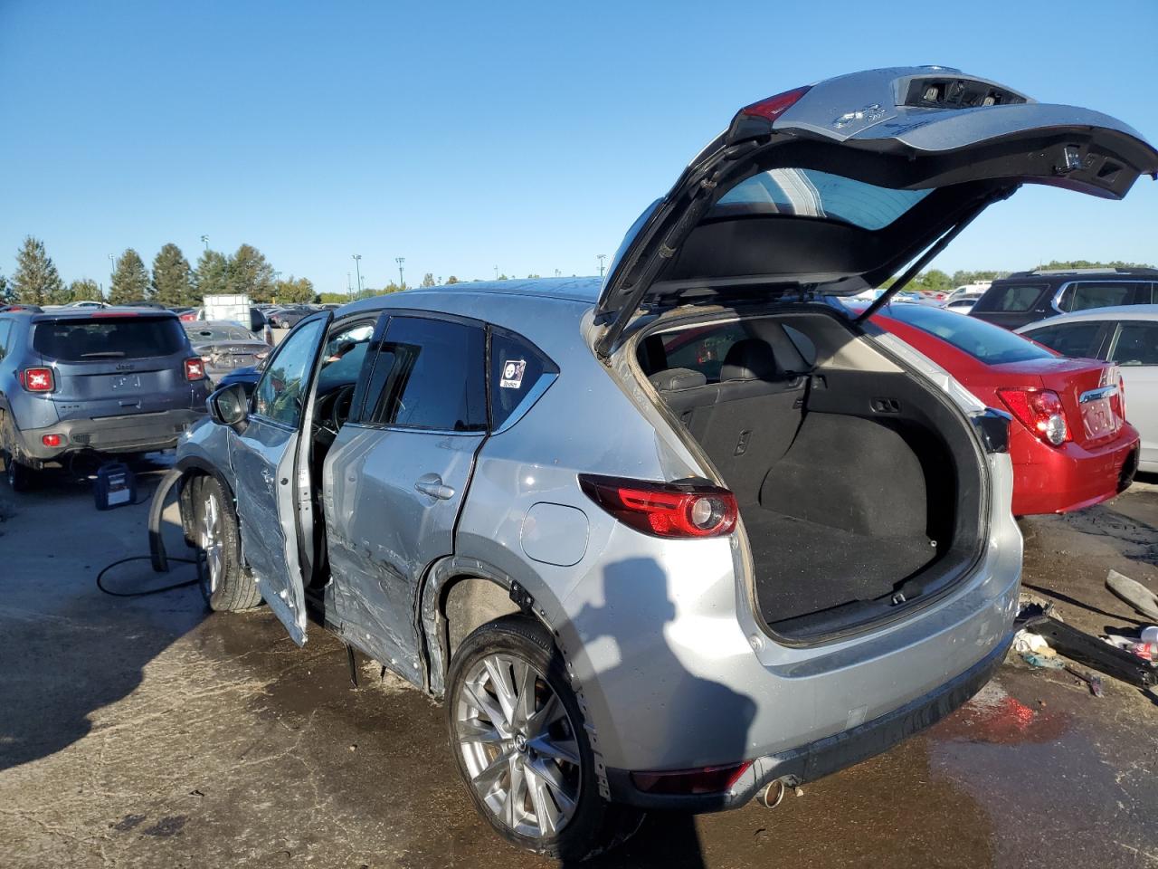 2021 Mazda CX-5 VIN JM3KFBDM6M0324373 Copart auction photo, side damage thumbnail 2