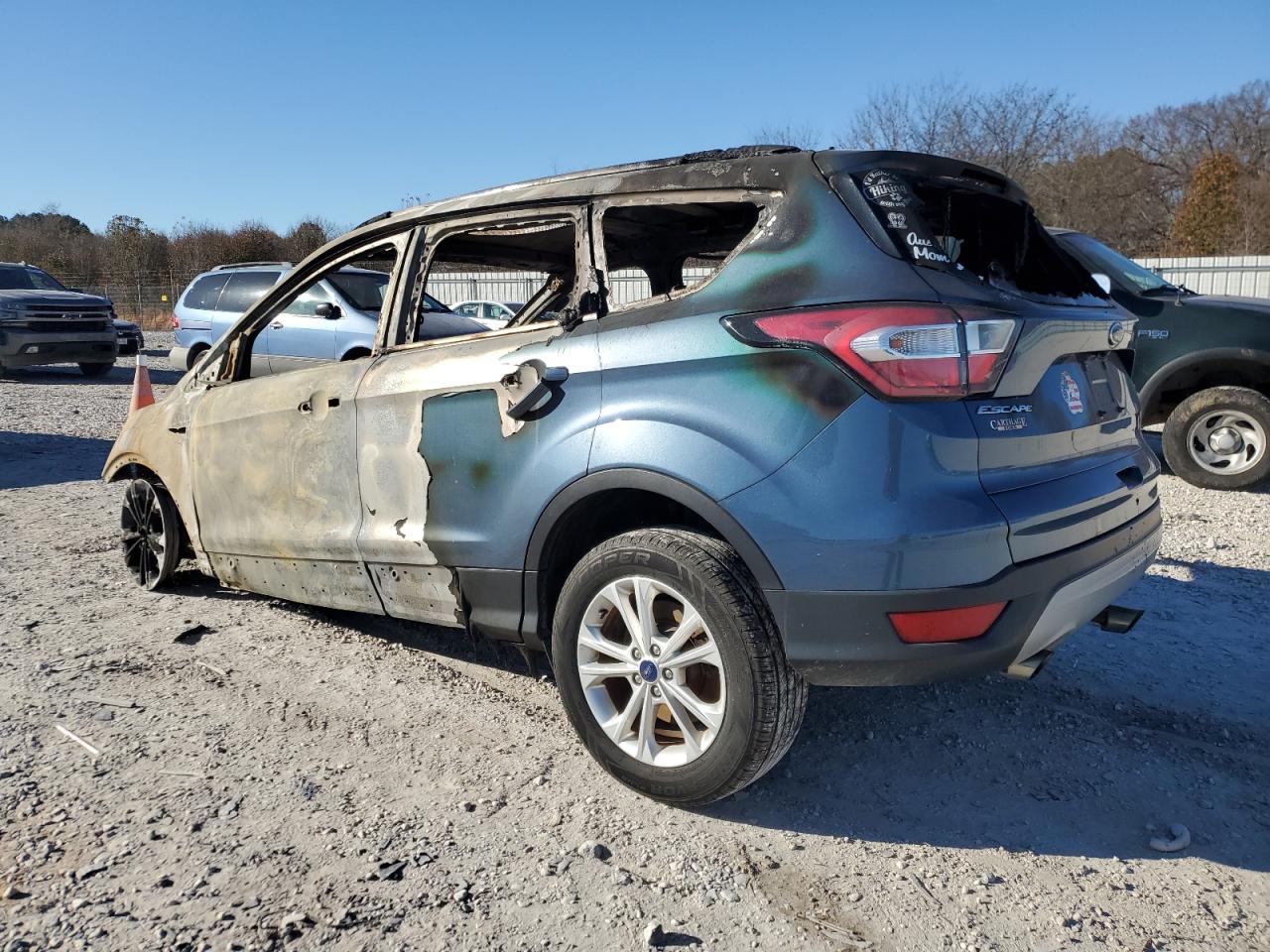 2018 Ford Escape VIN 1FMCU9GD7JUA29659 Copart auction photo, burn damage thumbnail 2