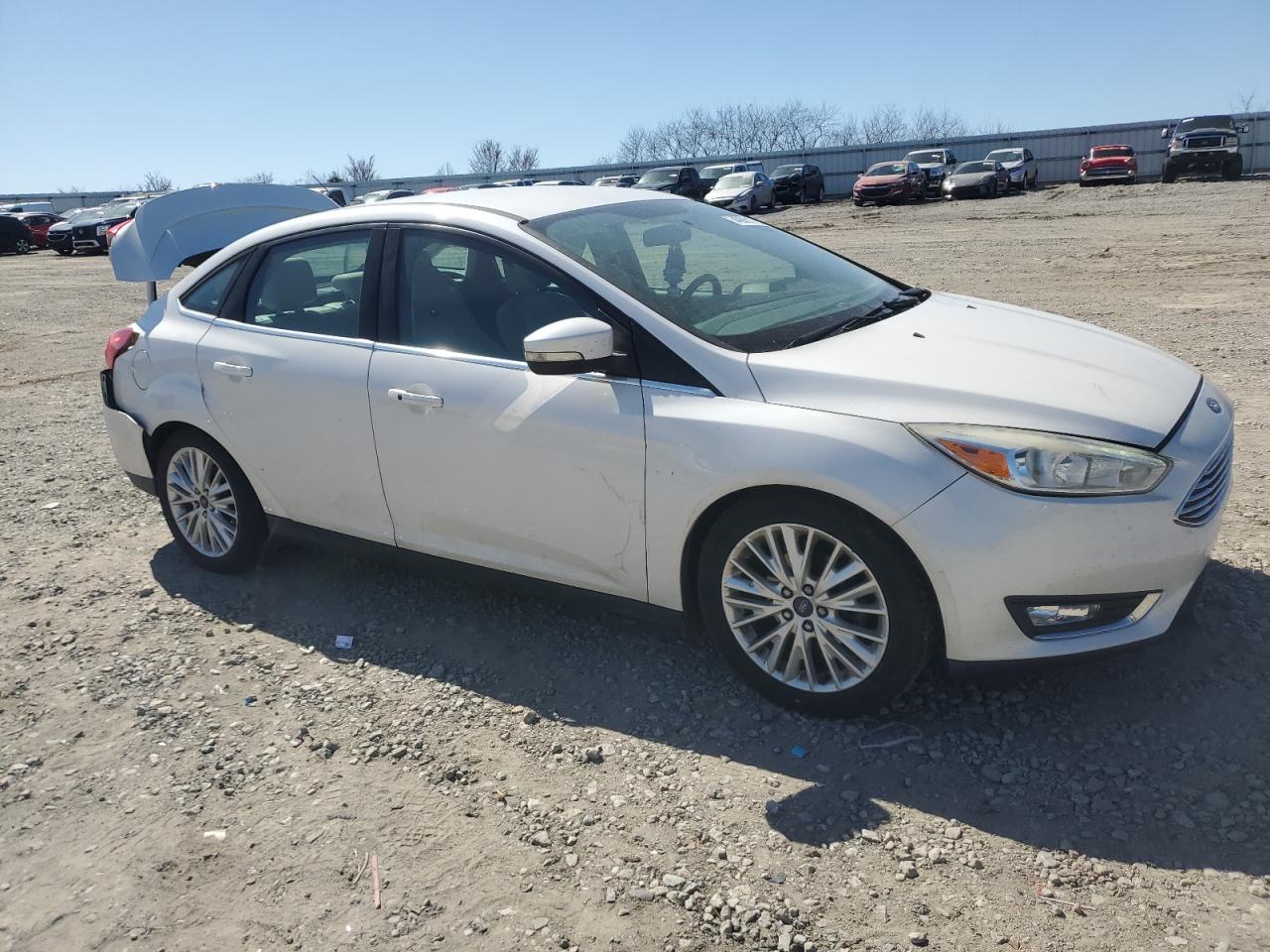 2016 Ford Focus VIN 1FADP3J29GL220363 Copart auction photo, rear end damage thumbnail 4