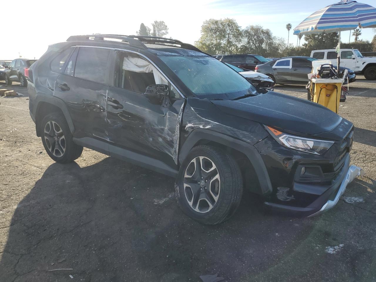 2019 Toyota RAV 4 VIN 2T3J1RFVXKC013881 Copart auction photo, all over damage thumbnail 4