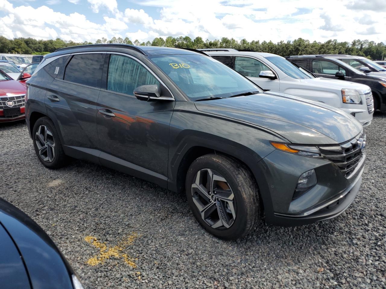 2022 Hyundai Tucson VIN KM8JECA16NU041940 Copart auction photo, water/flood damage thumbnail 4