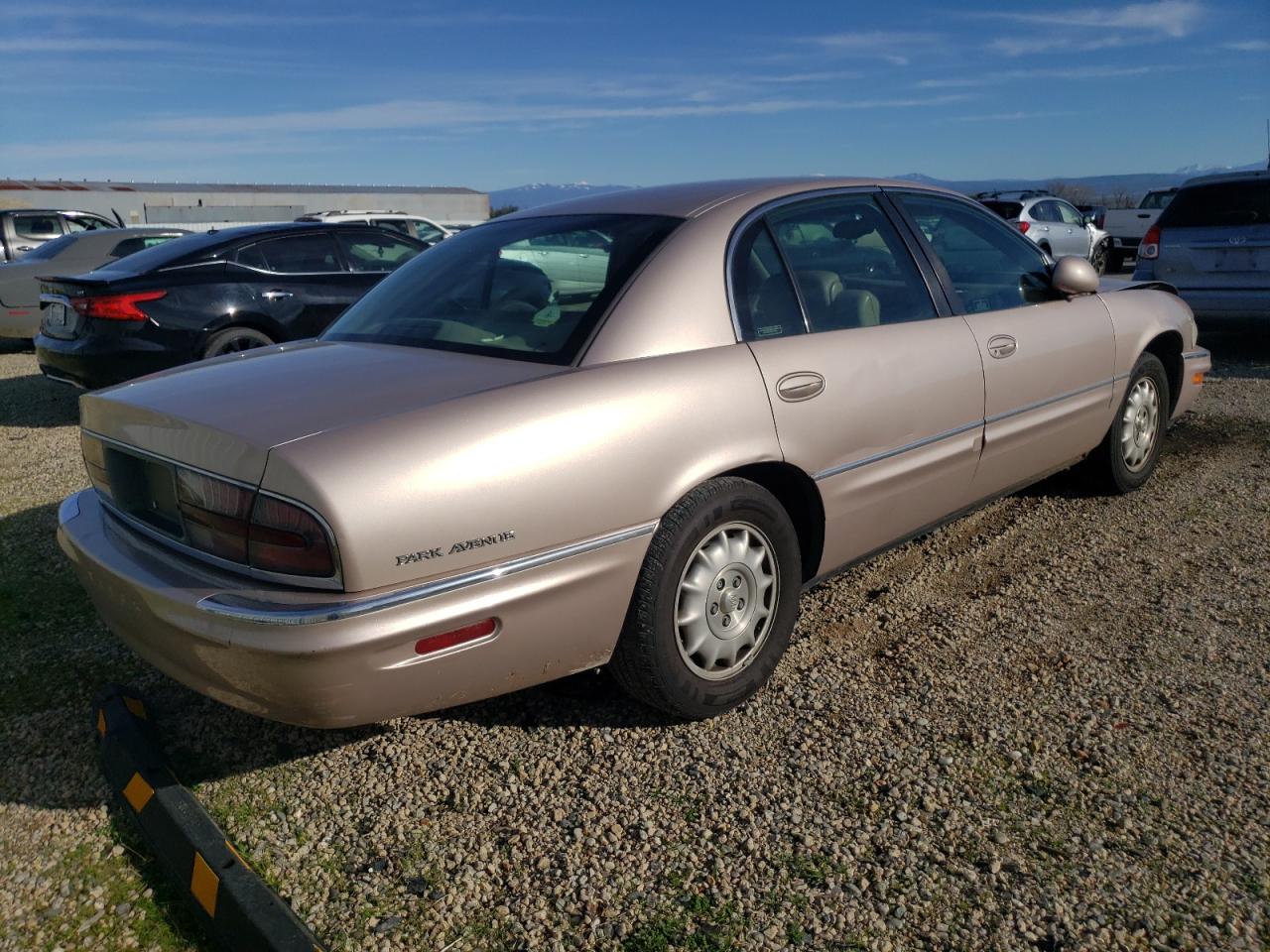 1999 Buick Park Avenue VIN 1G4CW52K0X4617825 Copart auction photo, front end / side damage thumbnail 3
