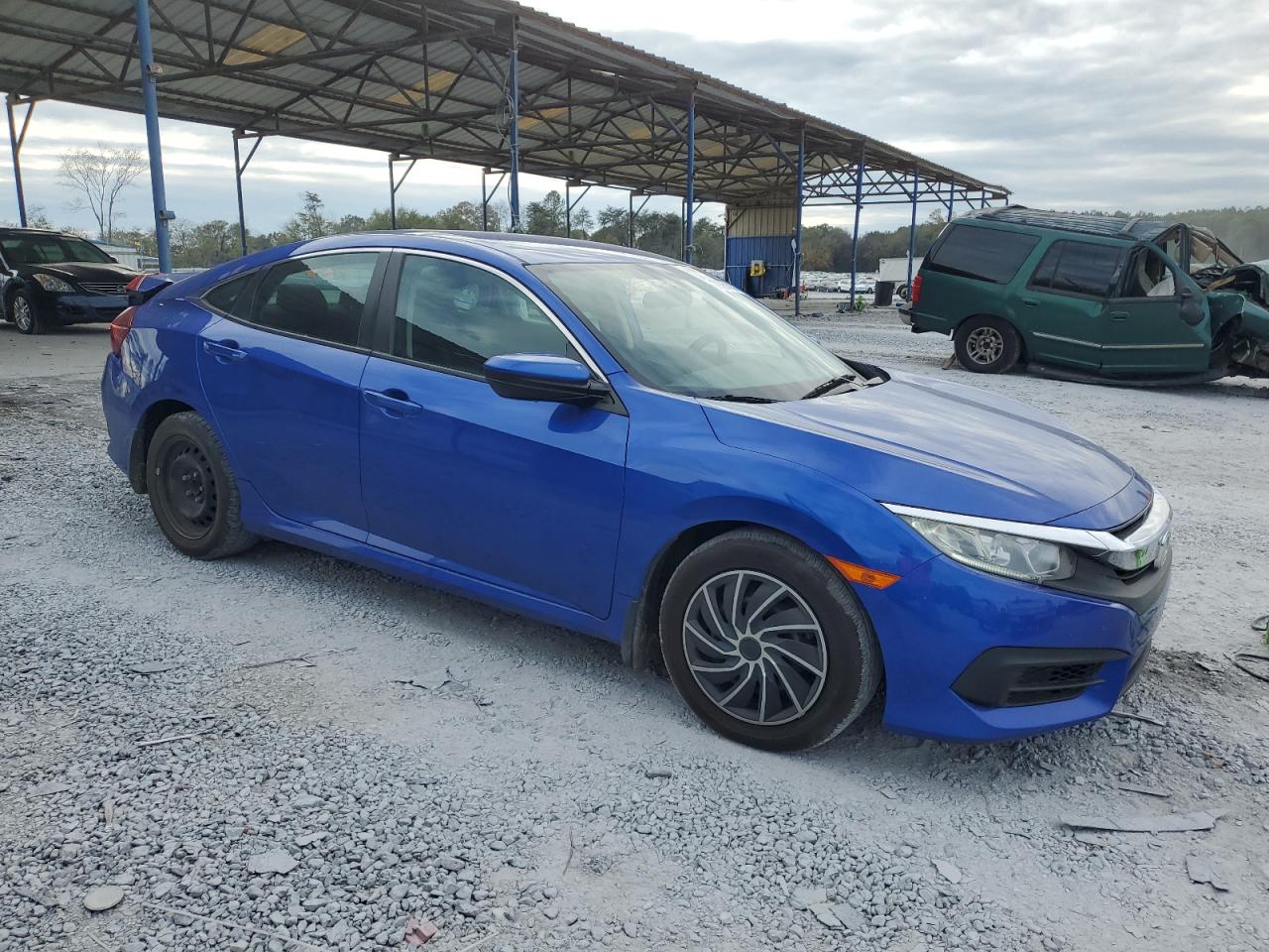 2018 Honda Civic VIN 19XFC2F51JE025577 Copart auction photo, rear end / minor dent/scratches damage thumbnail 4