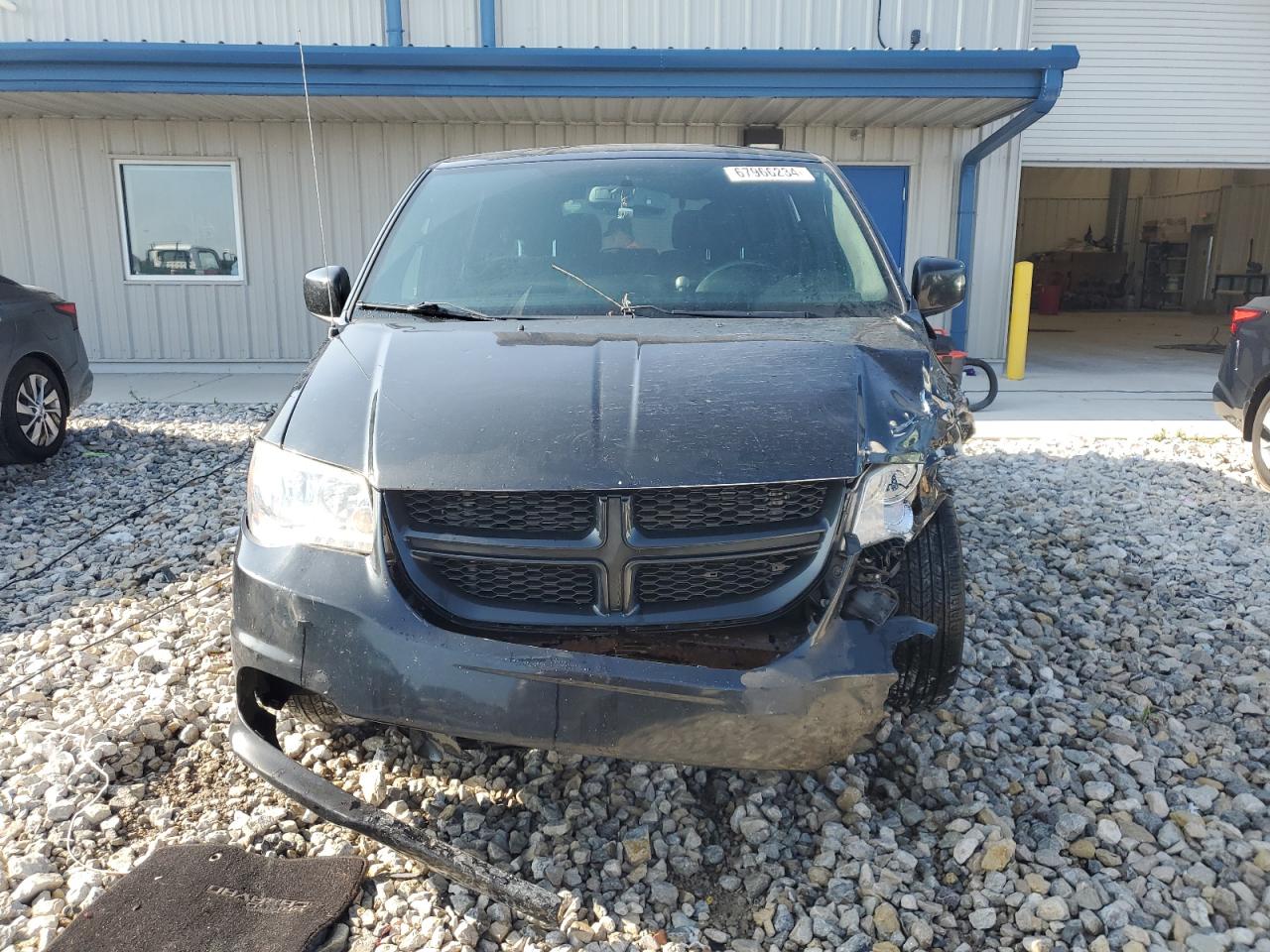 2014 Dodge Caravan VIN 2C4RDGBG7ER261489 Copart auction photo, front end / side damage thumbnail 5