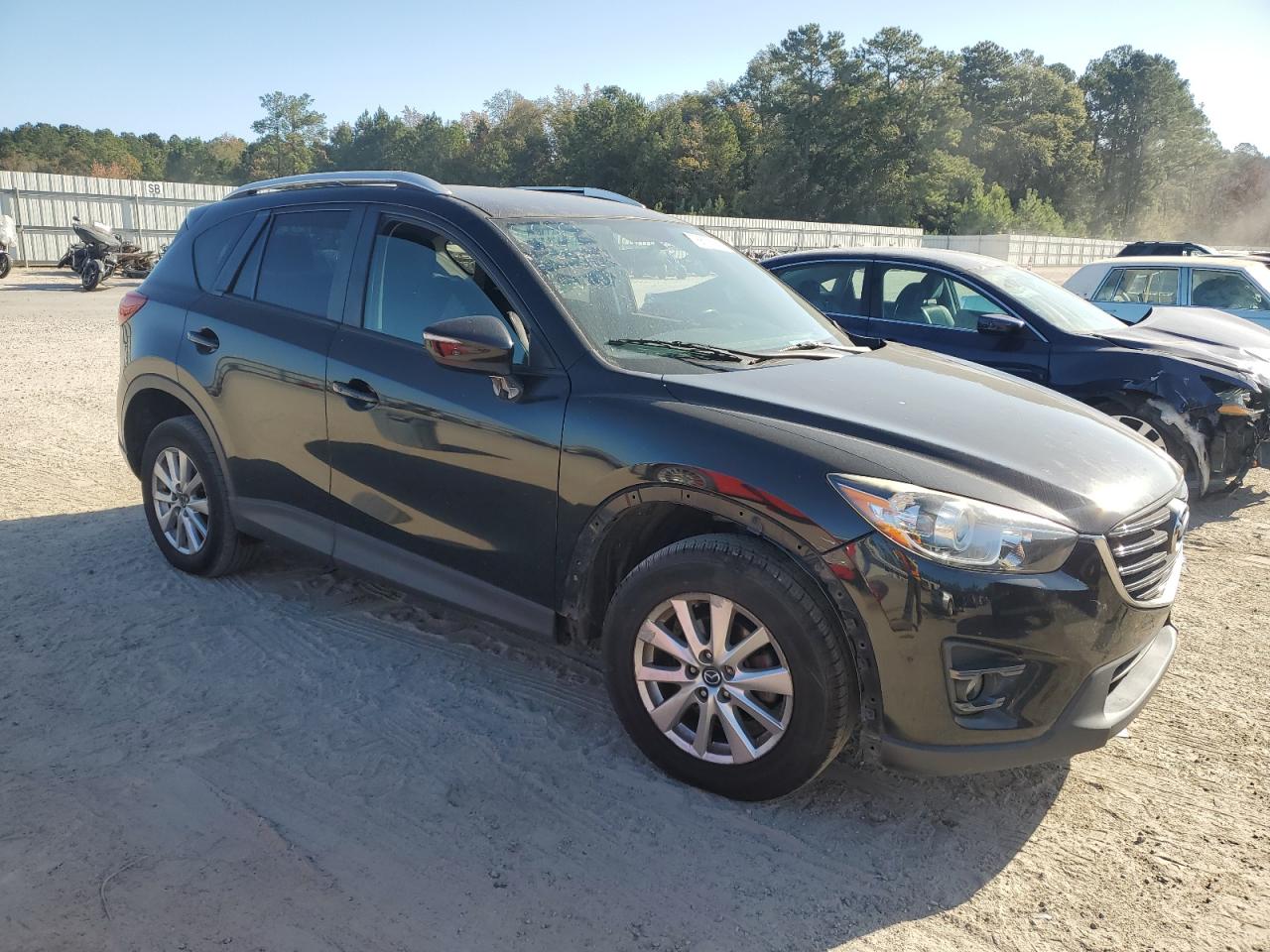 2016 Mazda CX-5 VIN JM3KE2CY2G0888324 Copart auction photo, front end / rear end damage thumbnail 4