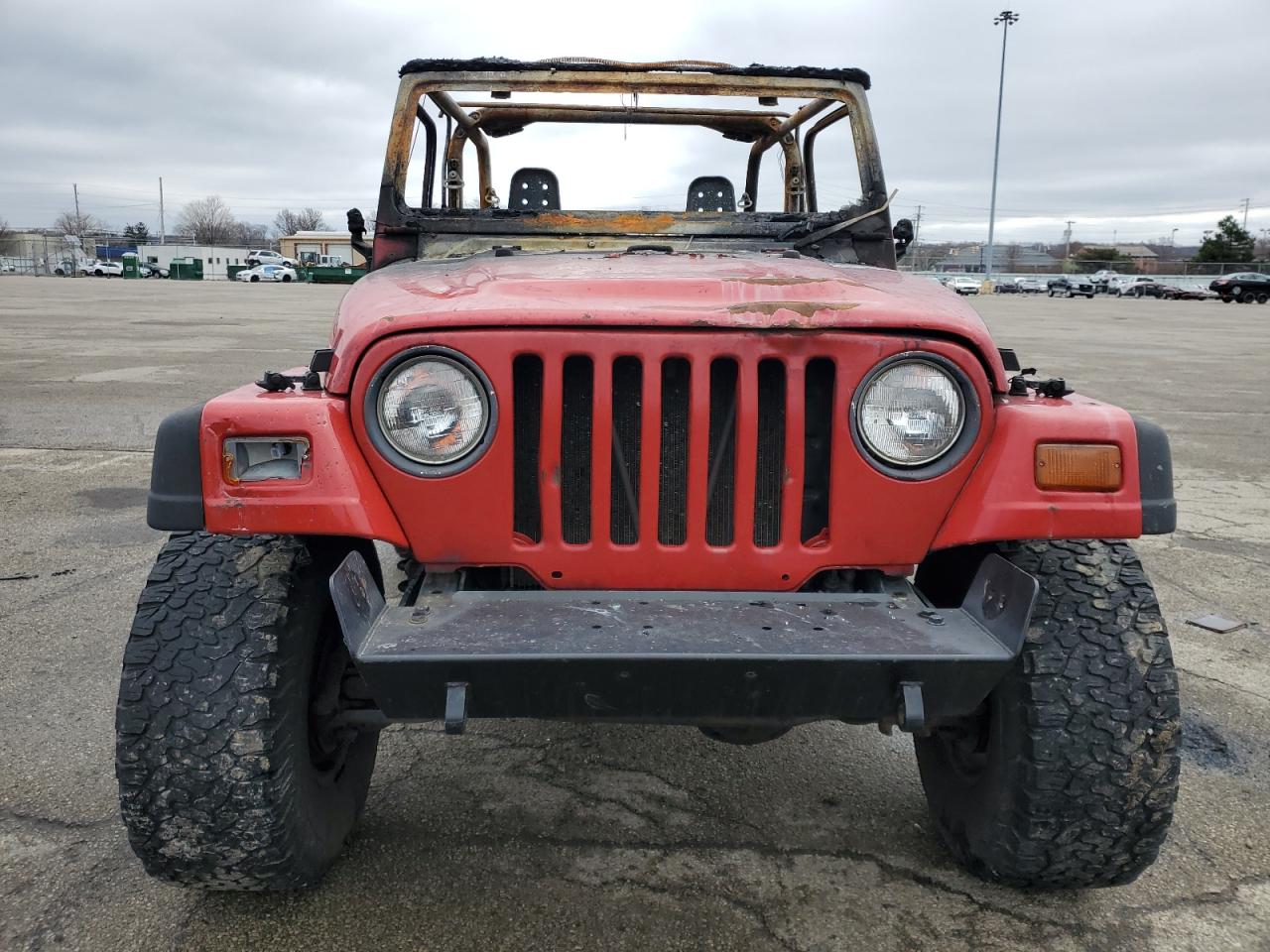 1999 Jeep Wrangler VIN 1J4FY19S0XP455035 Copart auction photo, burn damage thumbnail 5