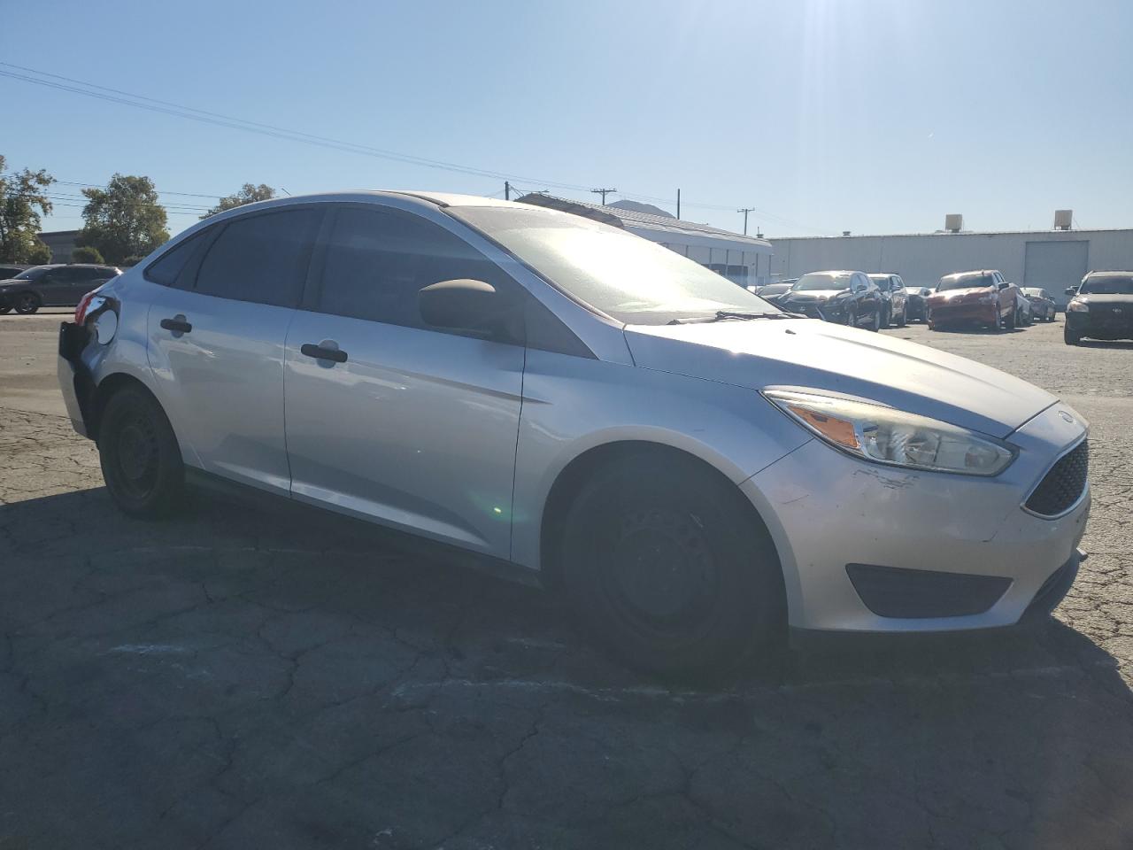 2015 Ford Focus VIN 1FADP3E22FL314609 Copart auction photo, rear end damage thumbnail 4