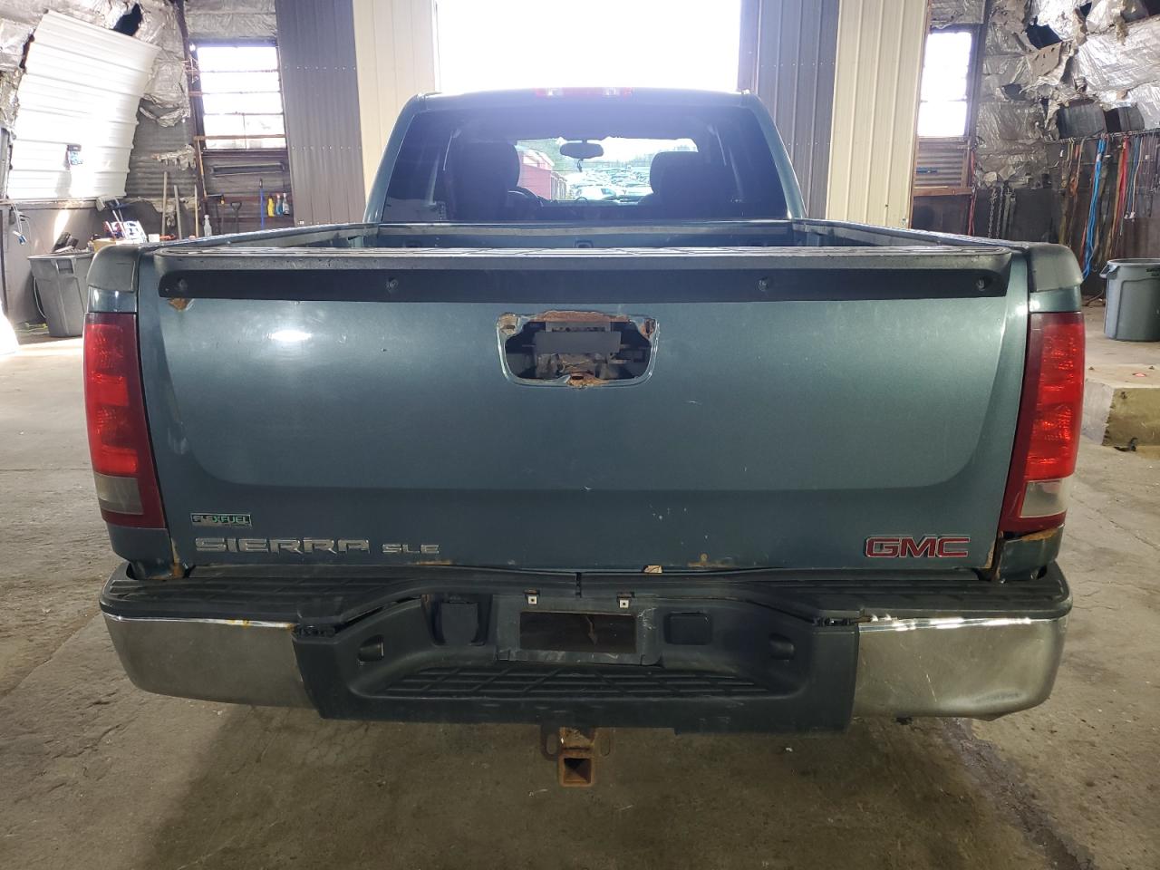 2011 GMC Sierra VIN 1GTR1VE03BZ338694 Copart auction photo, undercarriage / normal wear damage thumbnail 6
