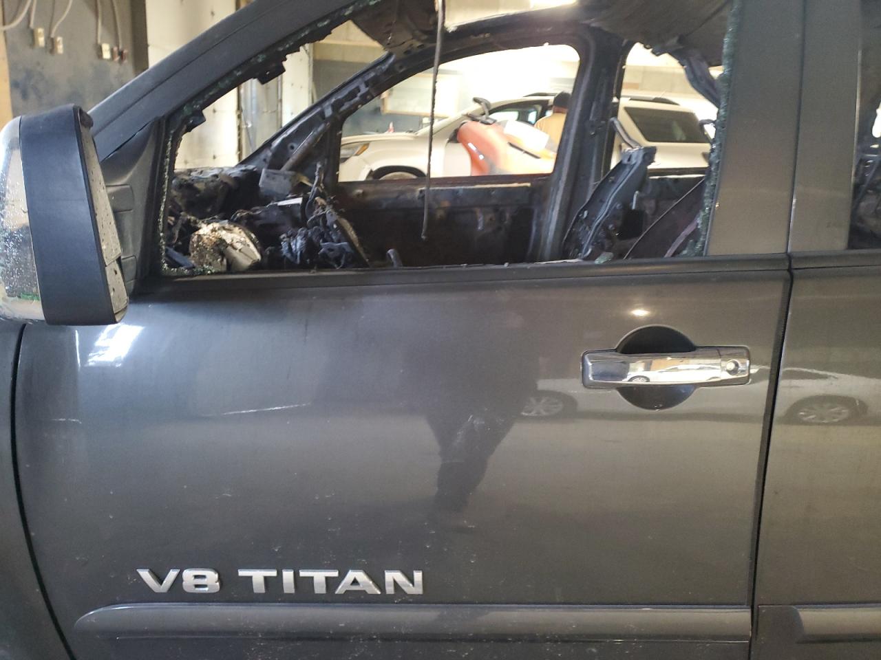 2012 Nissan Titan VIN 1N6AA0EC9CN318756 Copart auction photo, burn damage thumbnail 7