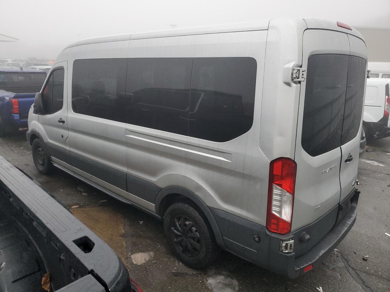 2016 Ford Transit VIN 1FBAX2CM1GKA00375 Copart auction photo, normal wear / minor dent/scratches damage thumbnail 2