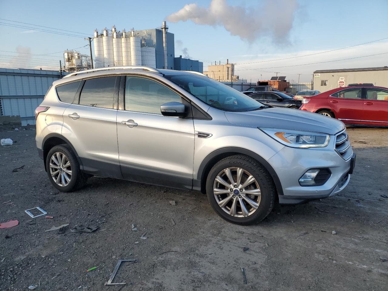 2017 Ford Escape VIN 1FMCU0JDXHUA90082 Copart auction photo, front end / side damage thumbnail 4