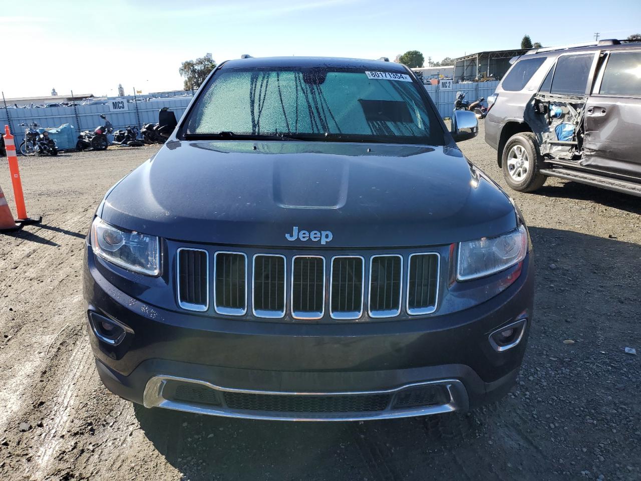2015 Jeep Grand Cherokee VIN 1C4RJFBG3FC854845 Copart auction photo, side / rear end damage thumbnail 5
