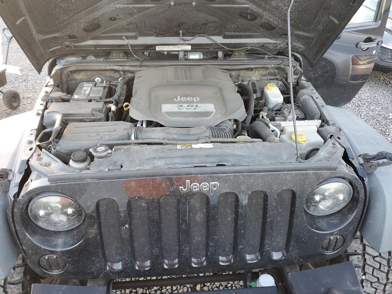 2012 Jeep Wrangler VIN 1C4HJWDG6CL200037 Copart auction photo, side damage thumbnail 11