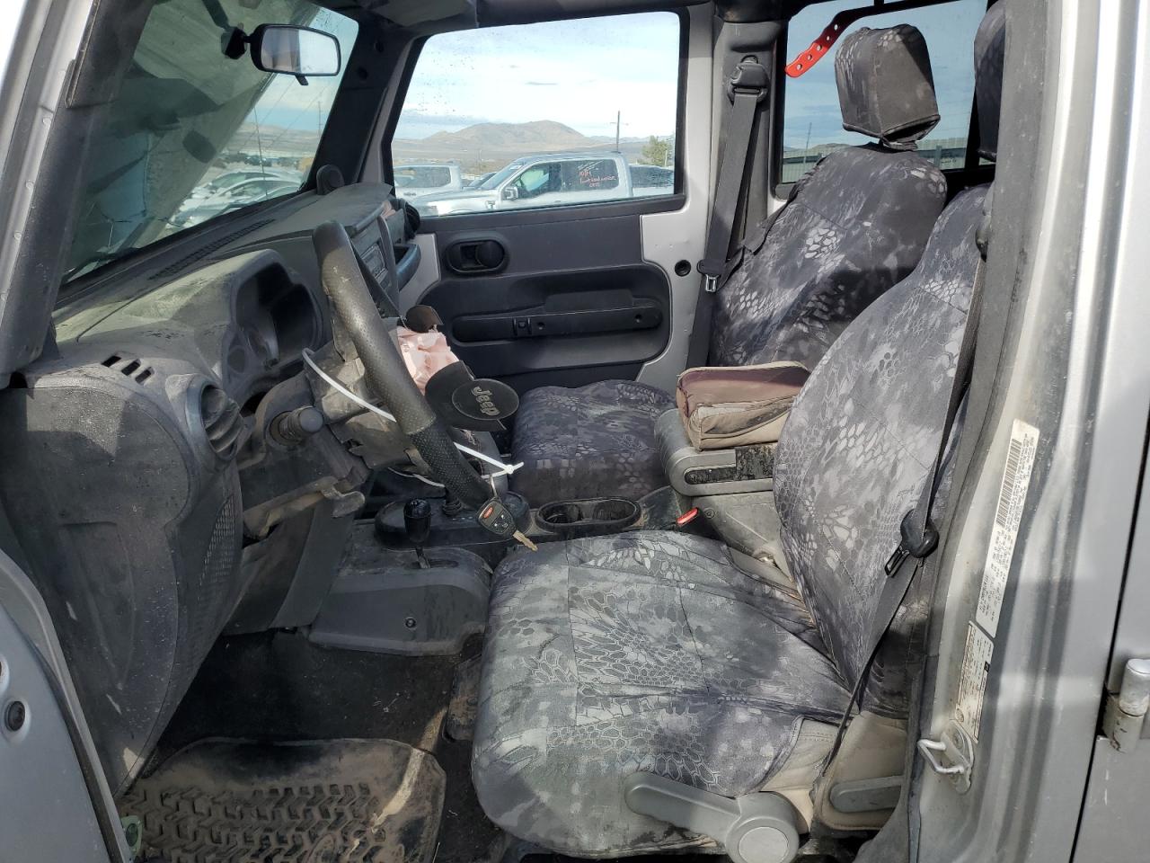 2009 Jeep Wrangler VIN 1J8GA69139L703848 Copart auction photo, front end / undercarriage damage thumbnail 7