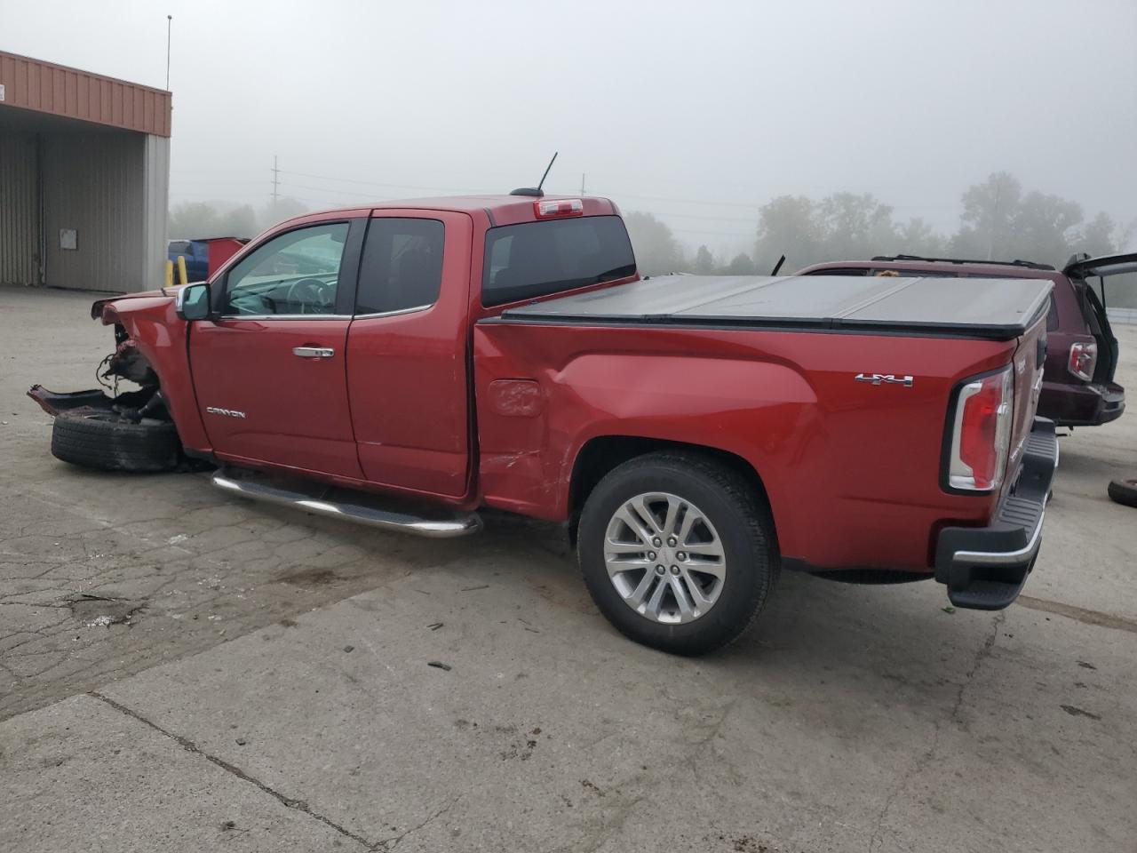 2015 GMC Canyon VIN 1GTH6CE39F1215532 Copart auction photo, front end / side damage thumbnail 2