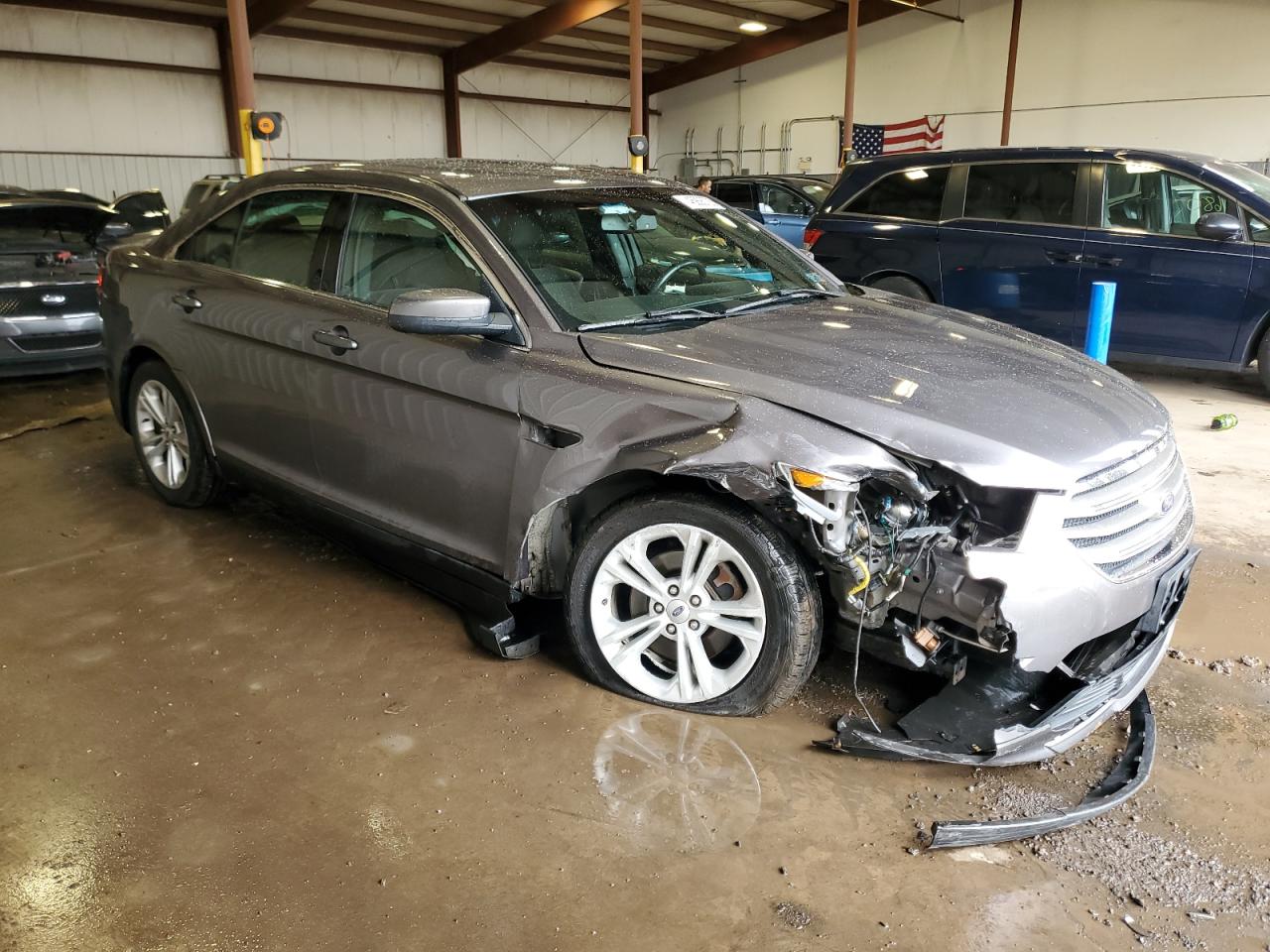 2014 Ford Taurus VIN 1FAHP2E87EG104174 Copart auction photo, front end / undercarriage damage thumbnail 4