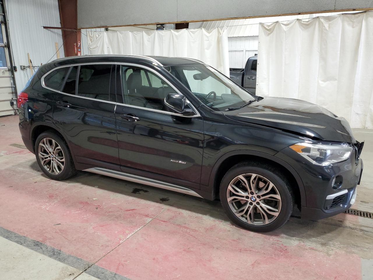 2017 BMW X1 VIN WBXHT3Z35H4A55644 Copart auction photo, front end damage thumbnail 4
