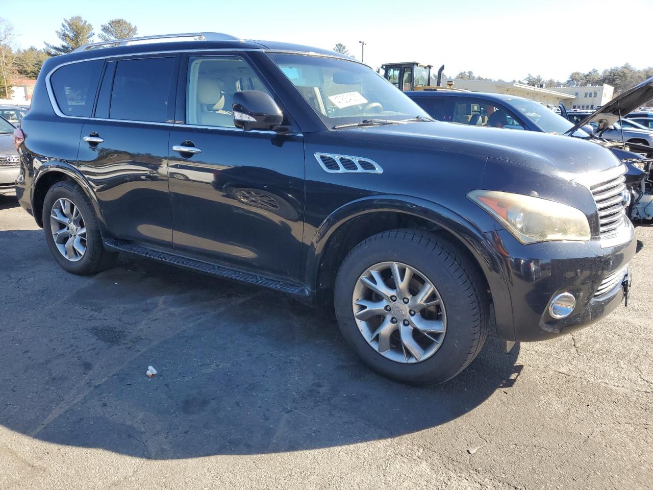 2011 Infiniti QX56 VIN JN8AZ2NC4B9303181 Copart auction photo, side / front end damage thumbnail 4