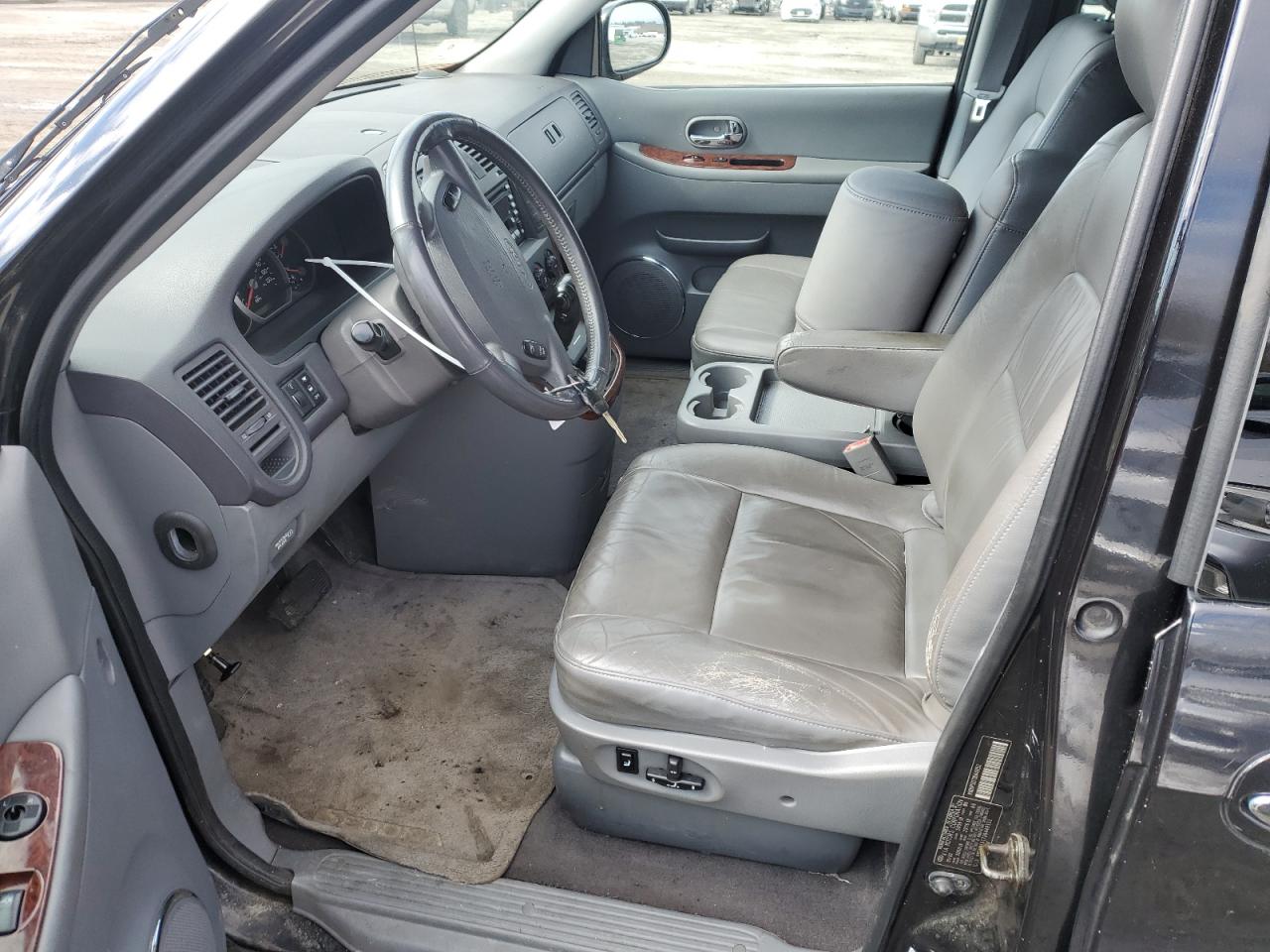 2003 KIA Sedona VIN KNDUP131736449152 Copart auction photo, front end / side damage thumbnail 7