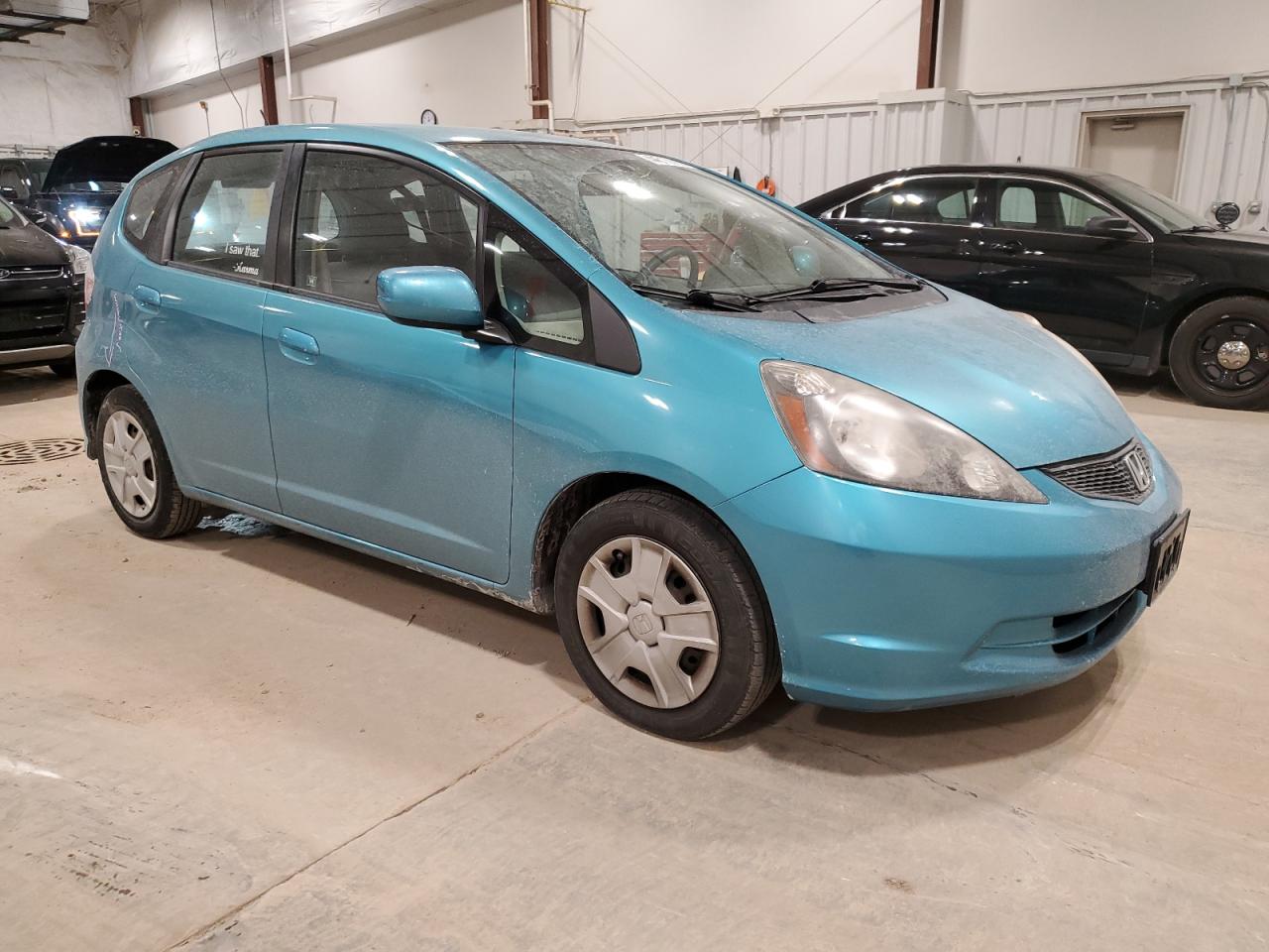 2013 Honda Fit VIN JHMGE8H30DC010303 Copart auction photo, side / minor dent/scratches damage thumbnail 4