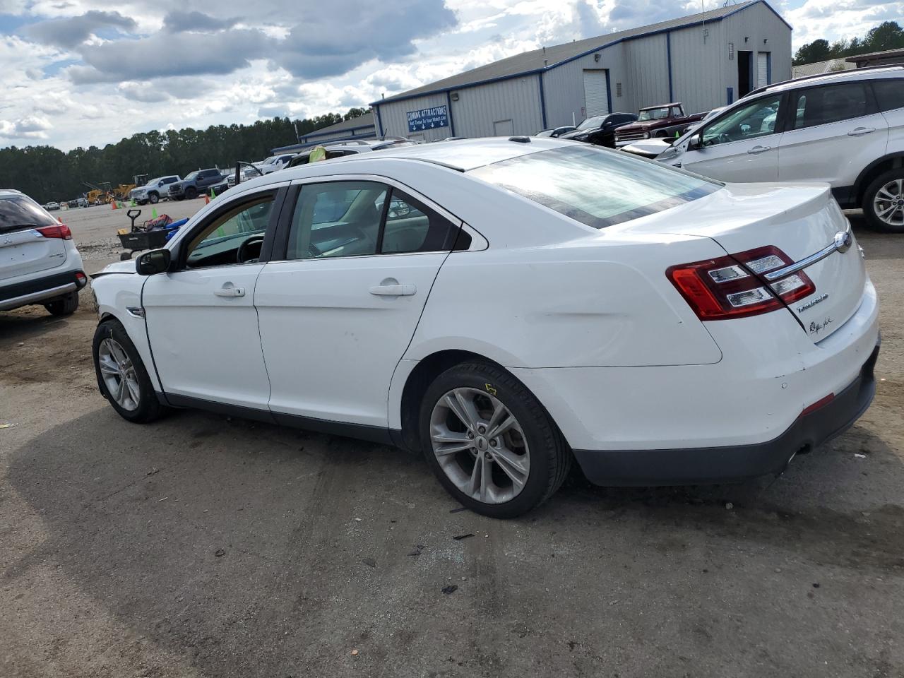 2016 Ford Taurus VIN 1FAHP2E80GG113477 Copart auction photo, front end / all over damage thumbnail 2