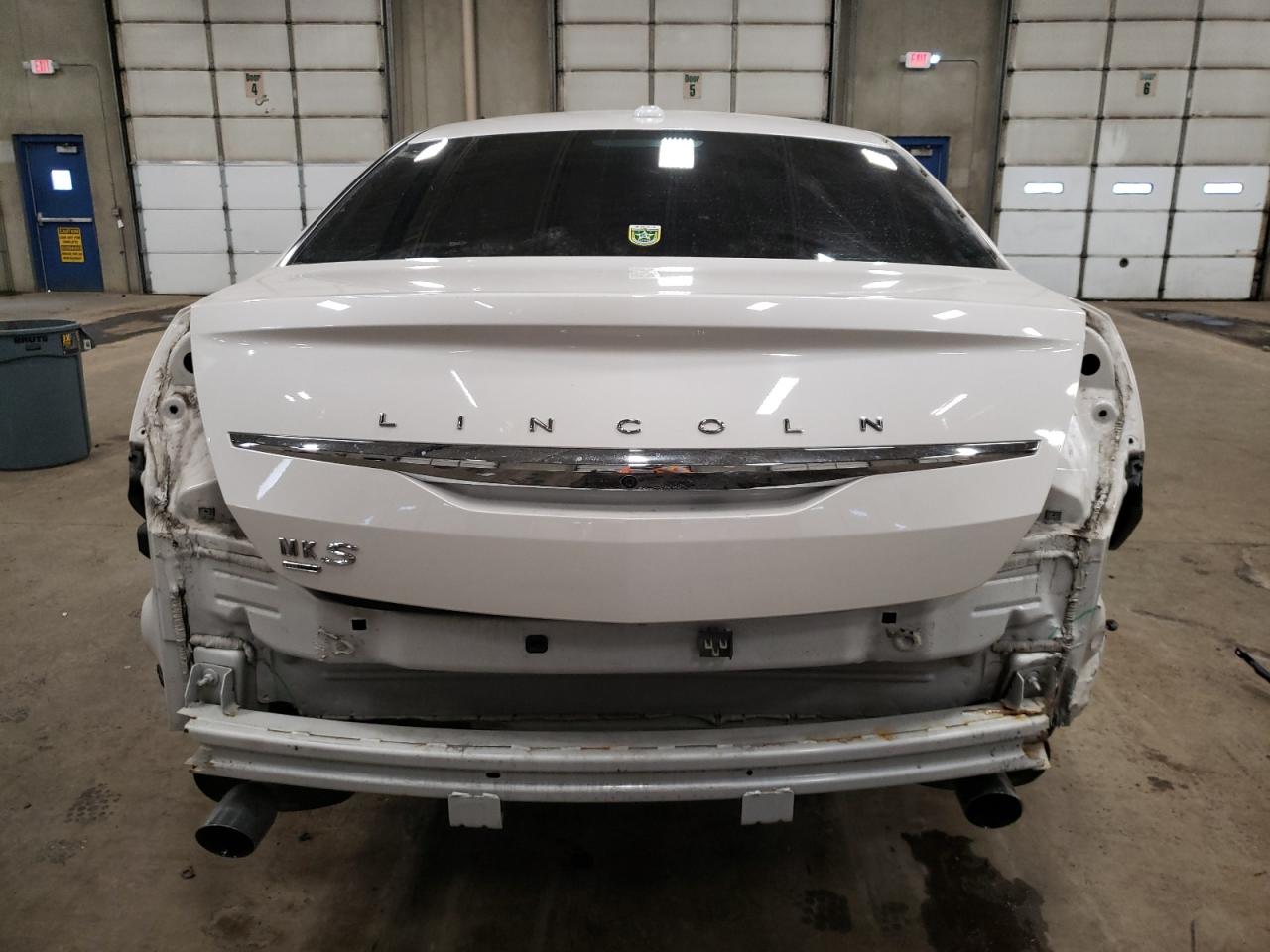 2016 Lincoln MKS VIN 1LNHL9FT7GG601192 Copart auction photo, rear end damage thumbnail 6
