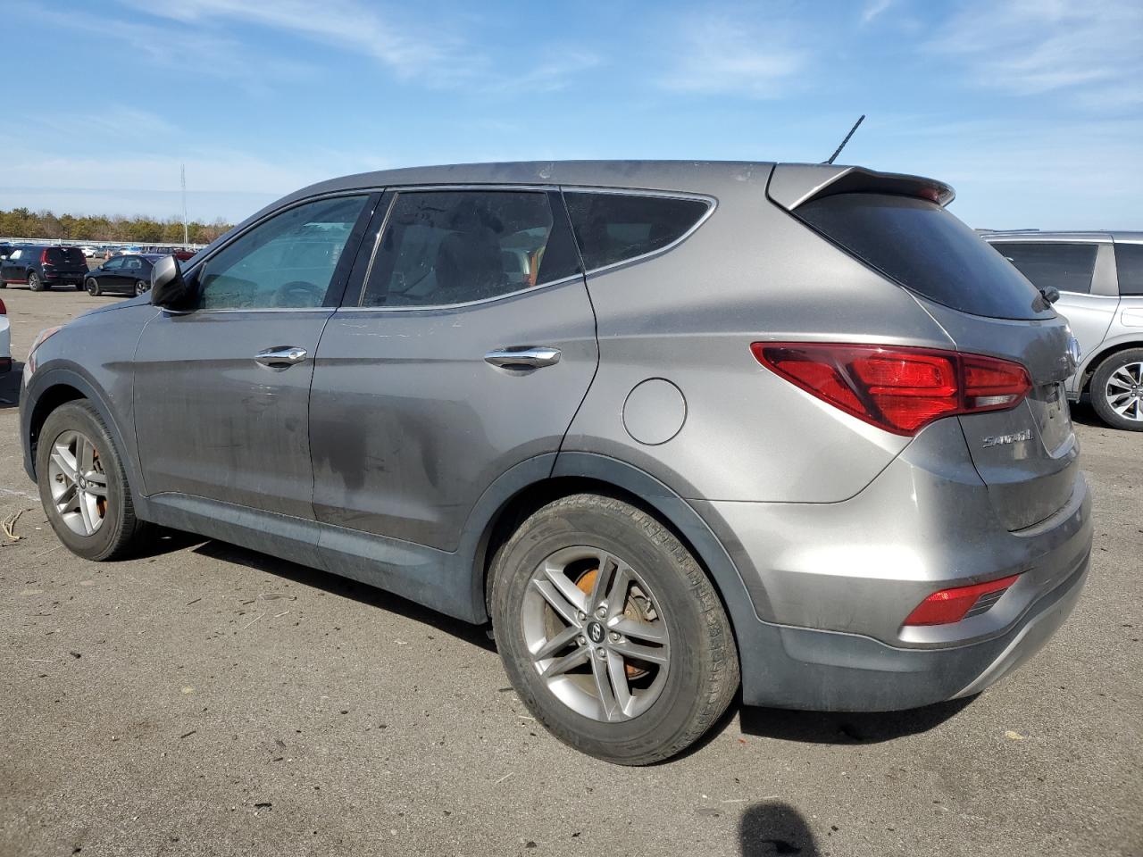 2018 Hyundai Santa Fe VIN 5NMZTDLB5JH053426 Copart auction photo, undercarriage / minor dent/scratches damage thumbnail 2