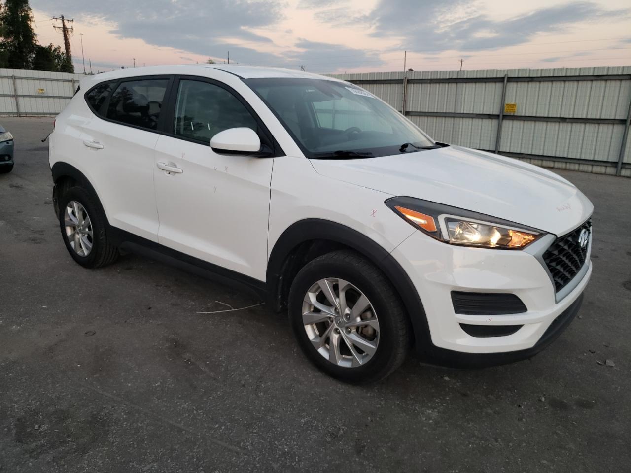 2019 Hyundai Tucson VIN KM8J23A46KU055335 Copart auction photo, rear end damage thumbnail 4