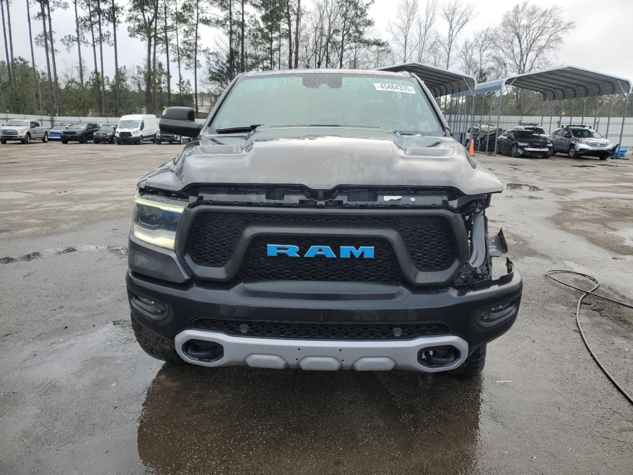 2021 RAM 1500 VIN 1C6SRFLTXMN760802 Copart auction photo, side / front end damage thumbnail 5