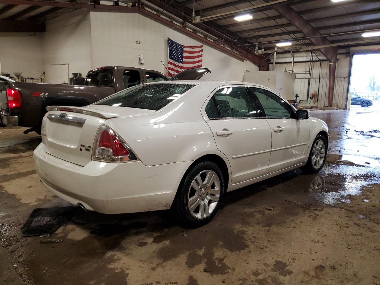 2009 Ford Fusion VIN 3FAHP02179R126377 Copart auction photo, side / mechanical damage thumbnail 3