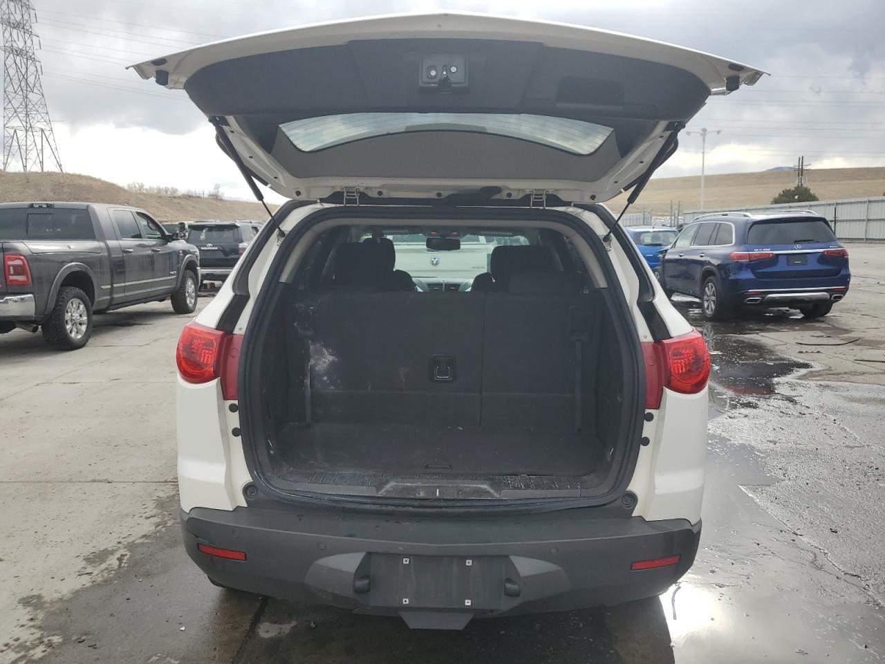 2011 Chevrolet Traverse VIN 1GNKRGED6BJ179541 Copart auction photo, side / hail damage thumbnail 6