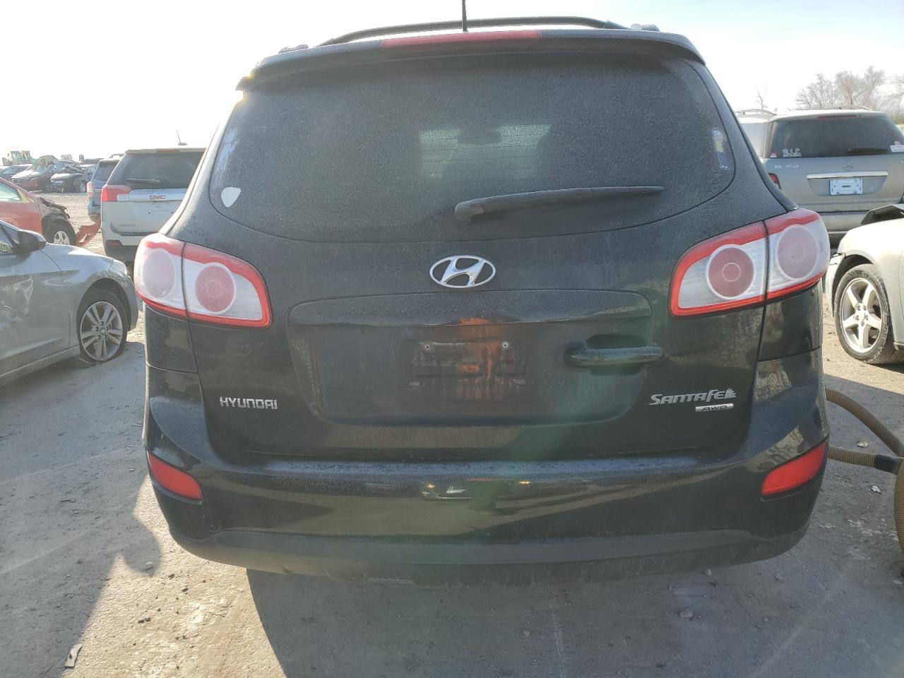 2010 Hyundai Santa Fe VIN 5NMSHDAG3AH351412 Copart auction photo, front end / minor dent/scratches damage thumbnail 6