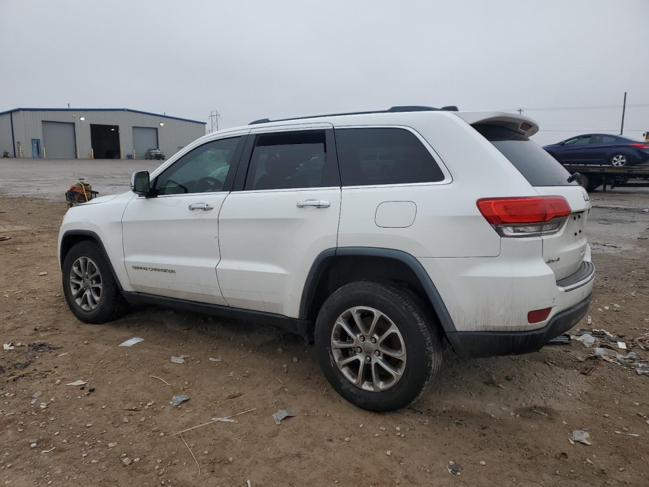 2015 Jeep Grand Cherokee VIN 1C4RJFBG4FC922215 Copart auction photo, front end / side damage thumbnail 2
