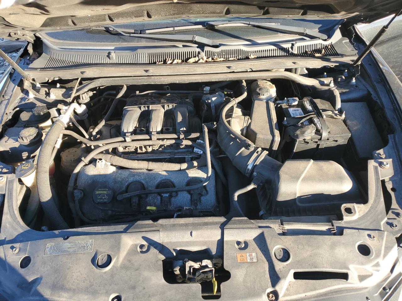 2012 Ford Taurus VIN 1FAHP2DW9CG136024 Copart auction photo, rear end / front end damage thumbnail 12