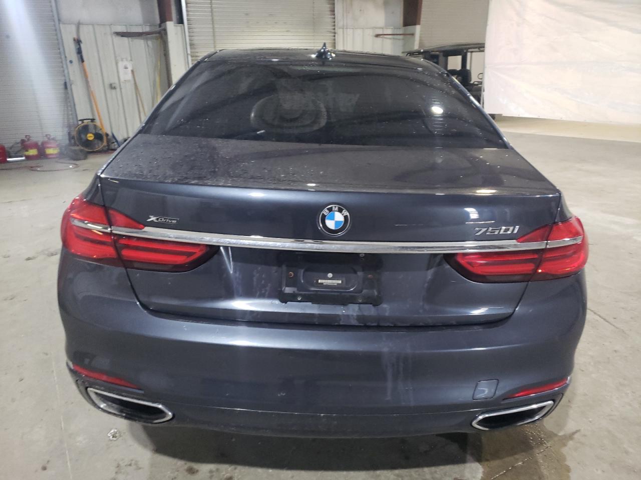 2016 BMW 7er VIN WBA7F2C55GGE12268 Copart auction photo, side damage thumbnail 6