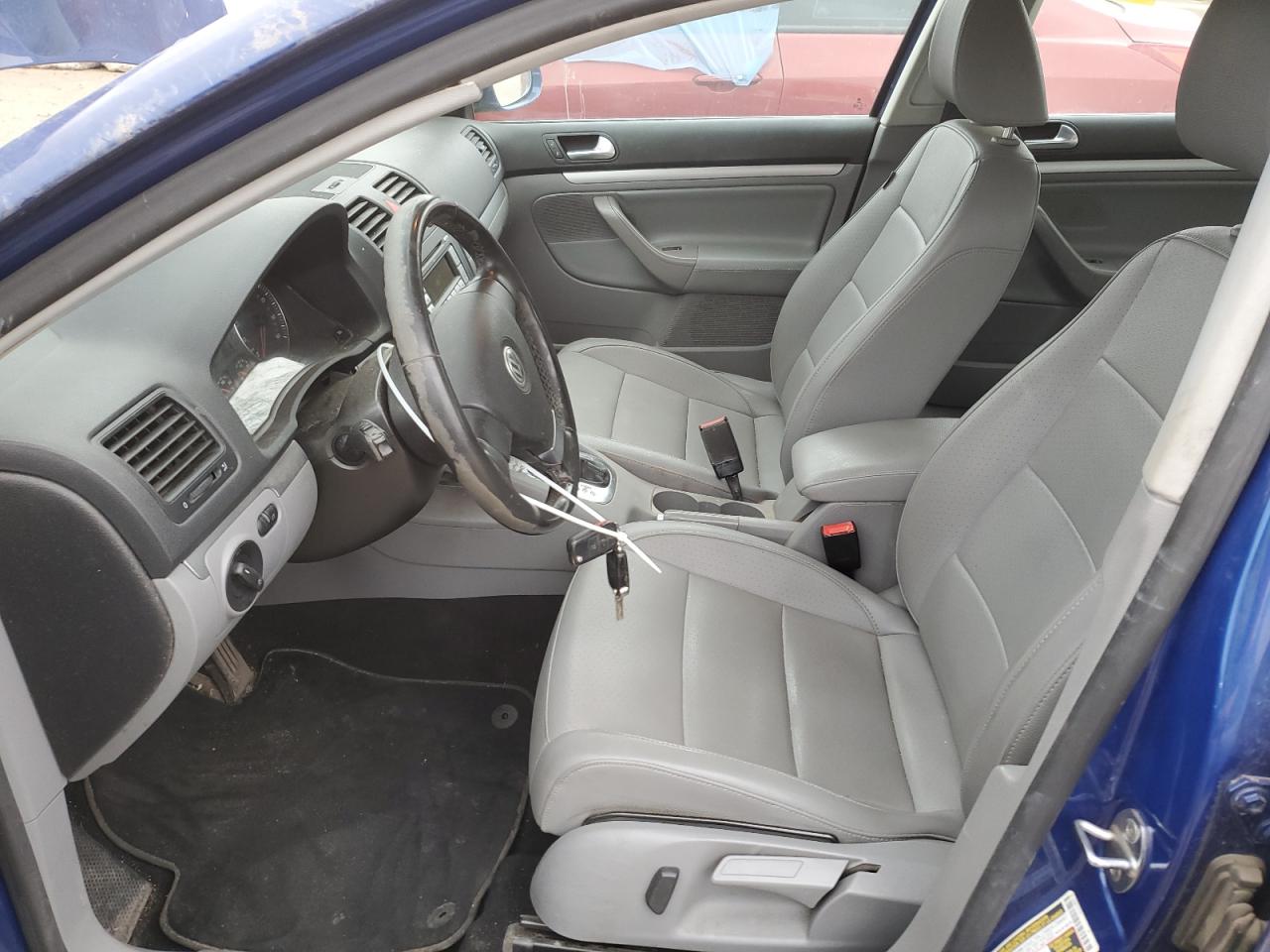 2009 Volkswagen Jetta VIN 3VWRM71K49M123182 Copart auction photo, front end damage thumbnail 7