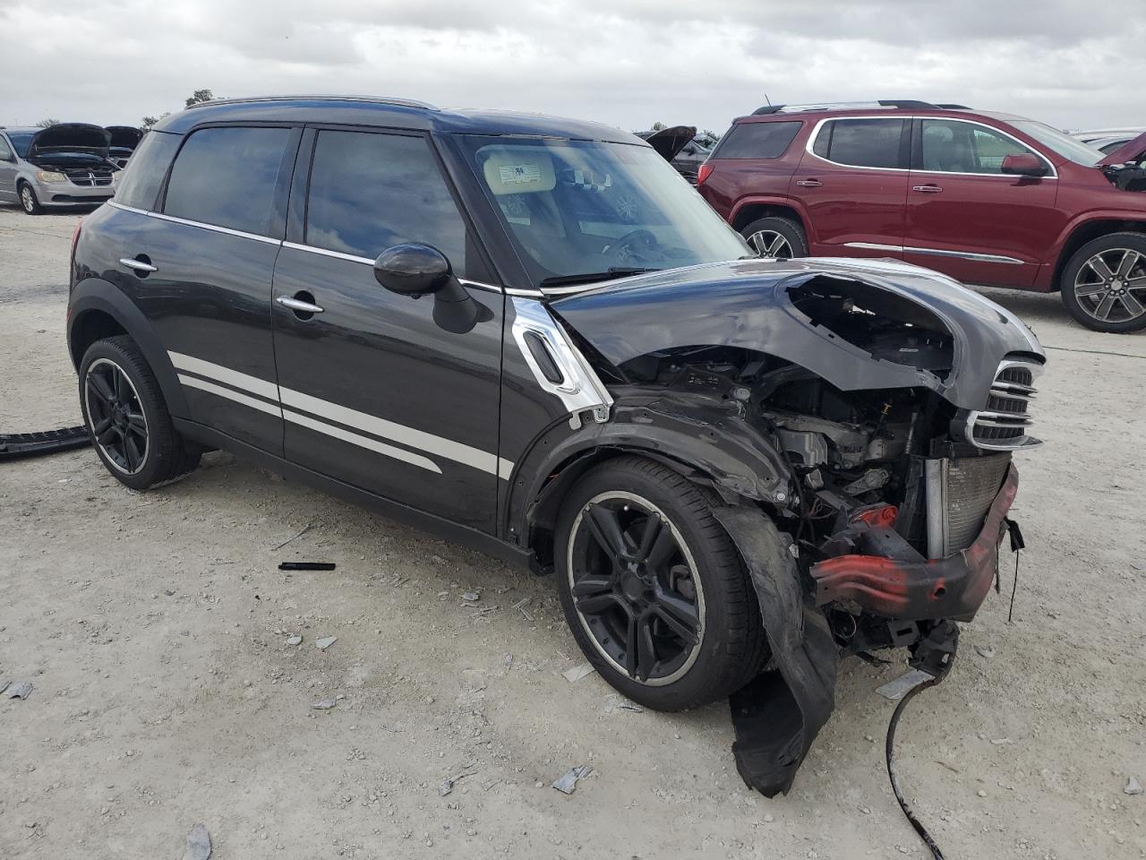2016 MINI Cooper VIN WMWZB3C54GWR48593 Copart auction photo, front end / side damage thumbnail 4