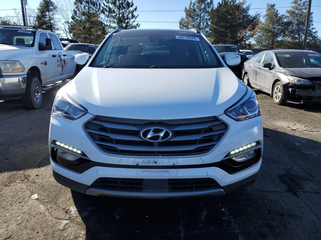2018 Hyundai Santa Fe VIN 5XYZWDLA5JG511572 Copart auction photo, rear end damage thumbnail 5