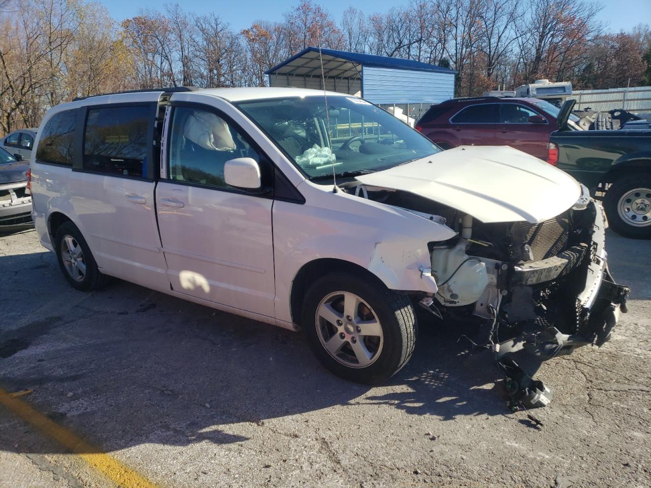 2013 Dodge Caravan VIN 2C4RDGCG8DR552399 Copart auction photo, front end / all over damage thumbnail 4