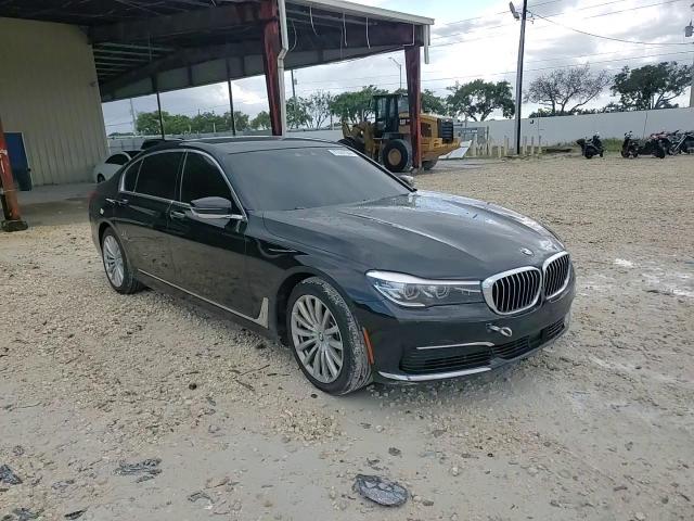 2019 BMW 7er VIN WBA7E2C50KB218642 Copart auction photo, water/flood damage thumbnail 14