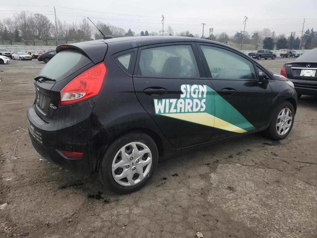 2012 Ford Fiesta VIN 3FADP4EJ8CM115670 Copart auction photo, front end / side damage thumbnail 3
