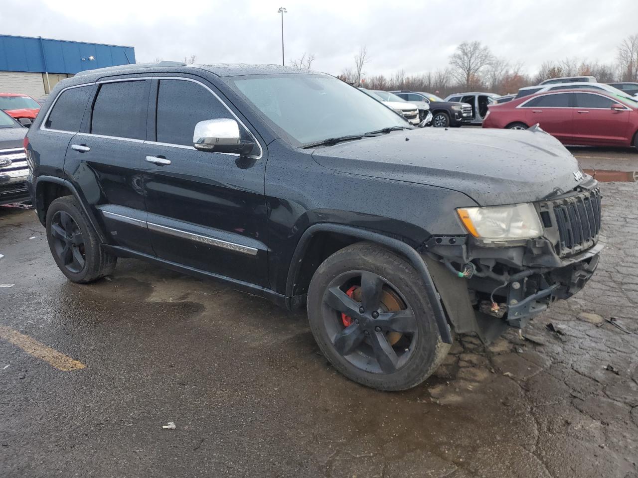 2011 Jeep Grand Cherokee VIN 1J4RS5GT2BC610928 Copart auction photo, front end / side damage thumbnail 4