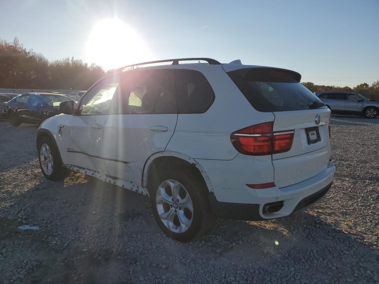 2012 BMW X5 VIN 5UXZV8C52CL424568 Copart auction photo, minor dent/scratches / side damage thumbnail 2