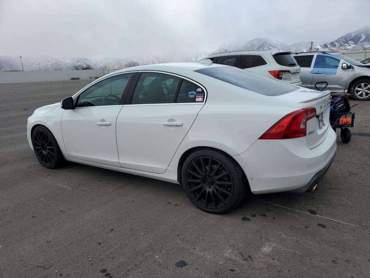 2016 Volvo S60 VIN YV126MFP7G2395371 Copart auction photo, side / mechanical damage thumbnail 2